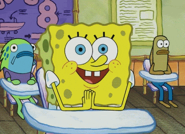 Spongebob sits eagerly at a desk, mind and heart open to new knowledge.